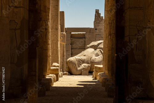 View of the Massive Fallen Colossus Statue of Ramses II Through Temple Columns