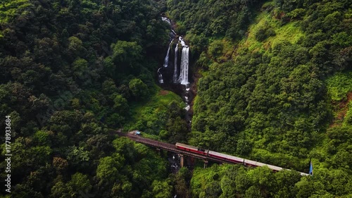 Train passing near Ukshi Waterfall , Ratnagiri, India 