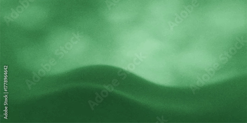 Abstract flowing green watercolor texture with soft light and shadow gradients
