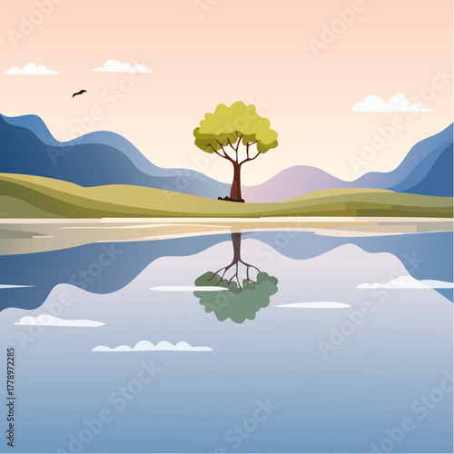 solitary tree reflected in the still waters of a foggy lake at sunrise