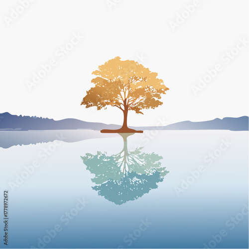 solitary tree reflected in the still waters of a foggy lake at sunrise
