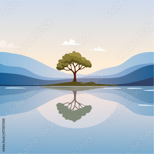 solitary tree reflected in the still waters of a foggy lake at sunrise