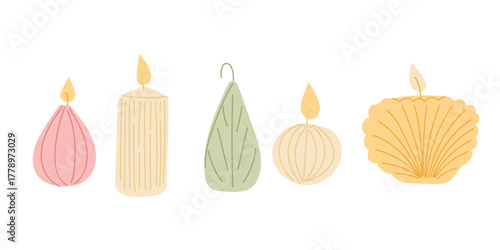 Set of decorative candles in soft colors and minimal shapes with cozy and modern design. Concept of hygge lifestyle, relaxation and warm home atmosphere