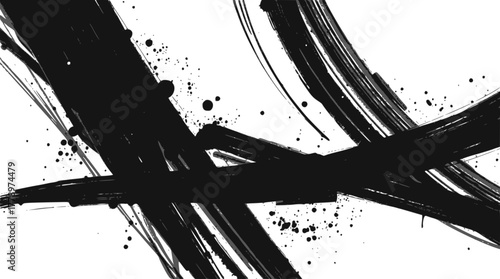 Abstract black ink brush strokes and splatters on a