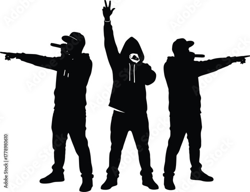 Silhouettes of three rappers performing on stage with microphones held