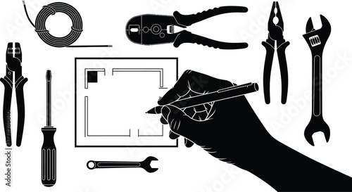 Black and white image of hand drawing a plan with tools surrounding it