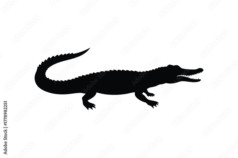 Naklejka premium Graphic silhouette of a fearsome crocodile in profile