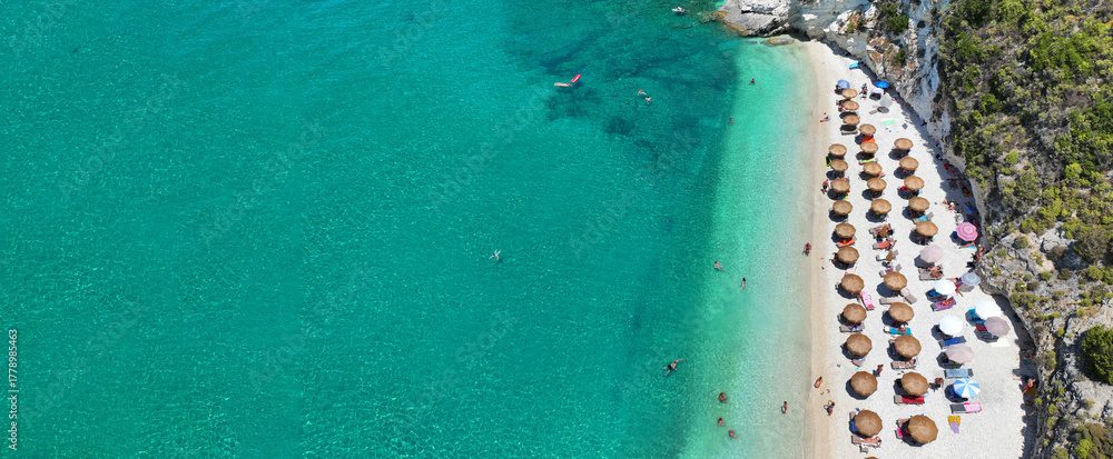 Fototapeta premium Aerial drone ultra wide photo of amazing organized sandy beach of Wolf rocks with emerald crystal clear sea, Zakinthos island, Ionian, Greece