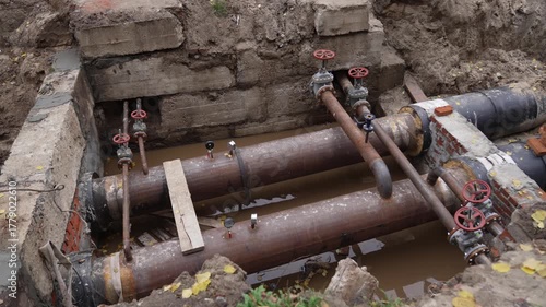 Replacement of old heating mains with new insulated pipes. Valves, taps, or manifolds for underground sewer and water pipes. Repair and restoration of piping systems, industrial plumbing work.