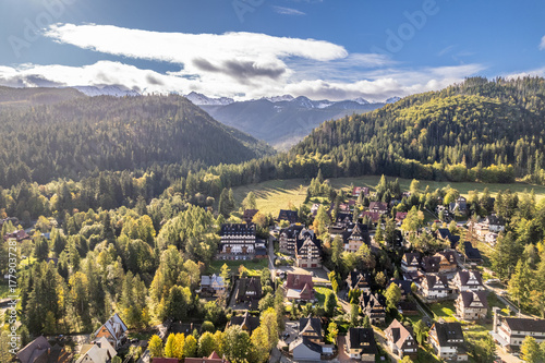 Fototapeta Naklejka Na Ścianę i Meble -  Aerial view of Zakopane town with Tatra Mountains, Poland, scenic mountain landscape