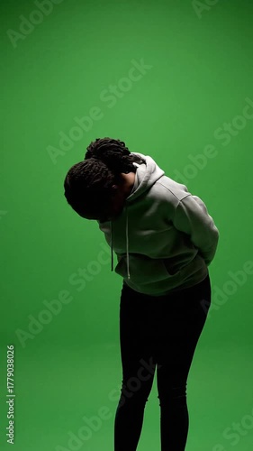 Suspect Bowing Head During Police Interrogation, Crime Investigation Concept