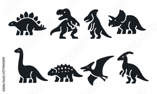 Silhouettes of prehistoric dinosaurs in different poses