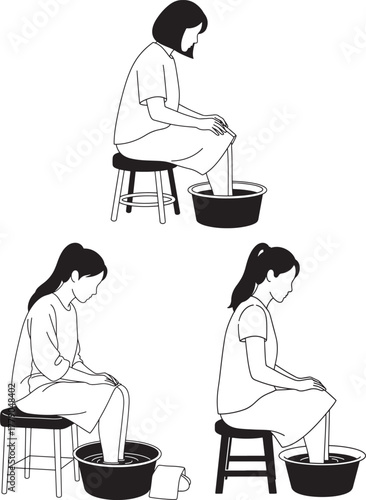 Woman washing feet in basin silhouette
