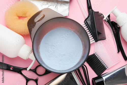 Fotografie Professional tools and products for hair dyeing on pink background, flat lay