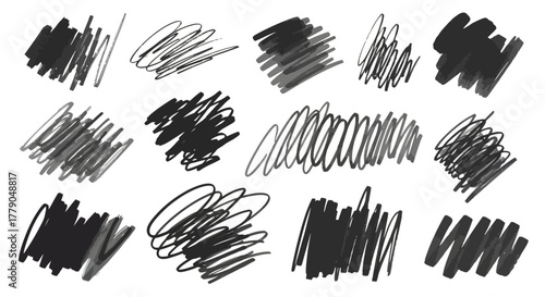 Diverse collection of chaotic black and grey scribbled brush strokes, artistic design element