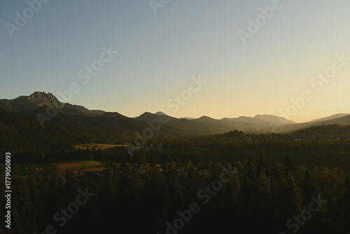 Fototapeta Naklejka Na Ścianę i Meble -  Beautiful sunset over Zakopane, Poland. Scenic view from Cyrhla village, summer evening