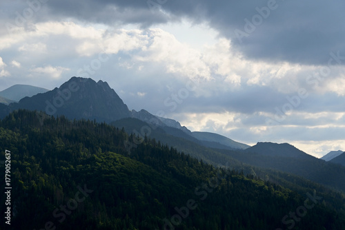 Fototapeta Naklejka Na Ścianę i Meble -  Giewont Mountain, Zakopane. Giewont peak seen from Cyrhla village. Cloudy summer evening. 