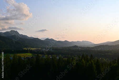 Fototapeta Naklejka Na Ścianę i Meble -  Beautiful sunset over Zakopane, Poland. Scenic view from Cyrhla village, summer evening