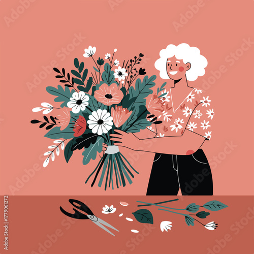 A person with white hair holds a floral bouquet, scissors, and flower parts sit on a table