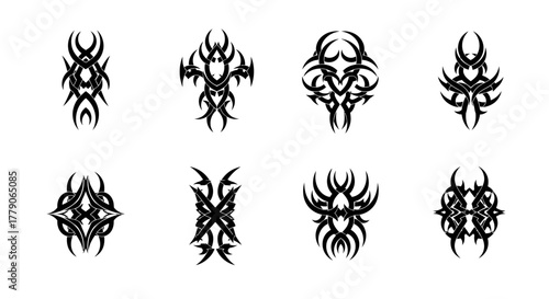Collection of eight intricate symmetrical black tribal tattoo designs on a clean white backdrop