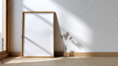 Modern minimal empty picture frame with natural light and shadow in stylish home interior decor perfect for wall art and contemporary design