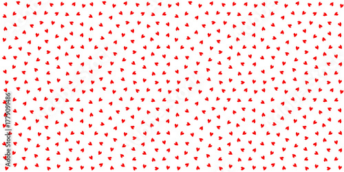 Dense seamless pattern with tiny red hearts randomly scattered on clean background. Cute romantic texture for Valentines Day fabric, gift wrapping paper, scrapbook background, or love card design. EPS