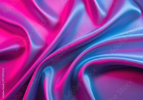 Iridescent pink and blue satin fabric texture with glossy folds, abstract silky background
