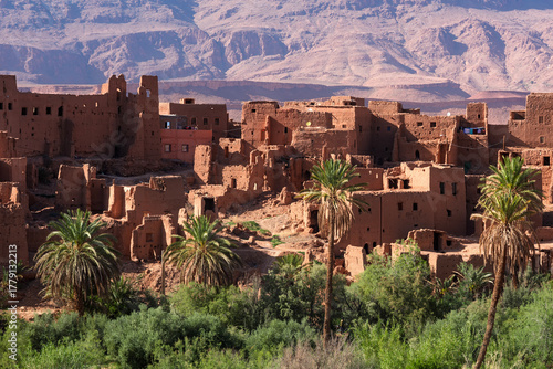 Traditional clay kasbahs in Tinghir town, a green palm oasis city in the Atlas mountains, Morocco