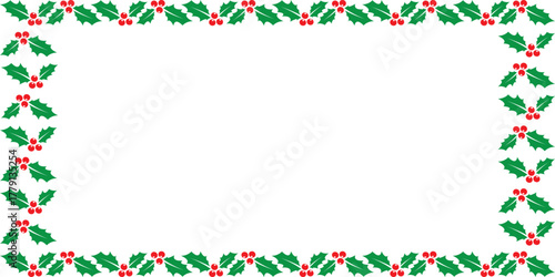 Frame of holly leaves and berries, which are often used as Christmas decorations
