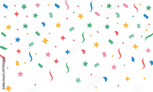 Colorful confetti and streamers falling on a white background