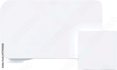 A clean white corner of a modern electronic device with a small square attached.