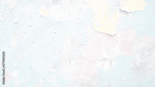 A soft blue wall showcases a textured surface with gentle patterns, creating a tranquil mood. This serene setting enhances the overall calmness of the room.