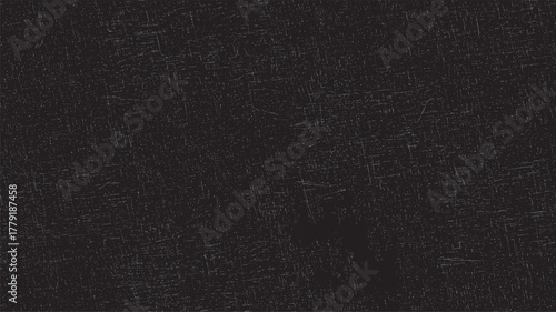 Dark textured background with subtle white scratches and speckles creating a distressed or aged surface effect