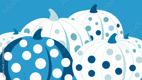Whimsical blue and white polka dot pumpkins create a festive autumnal display against a solid blue background