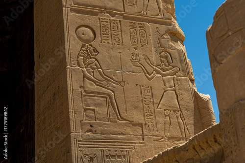 Ancient Egyptian wall relief with gods, Philae Temple, Aswan, Egypt