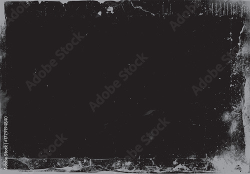 Dark textured background with distressed grunge edges and scattered white speckles black
