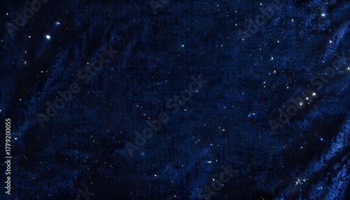 Deep Midnight Cosmos: Abstract dark blue background texture resembling space clouds and sparkling with tiny, bright stars. Ethereal, moody backdrop