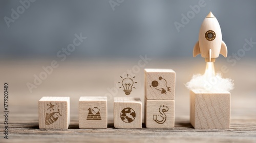Rocket launching from wood cube with business icon, Start-up, Creativity, Big idea, Business goals management, Investment on new project to wealth, Company strategy target, Sustainable financial plan