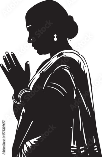 Indian woman praying (Namaste/Anjali Mudra) silhouette isolated 