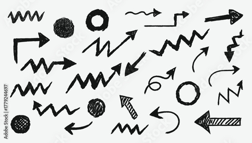 Scribble arrow set with wax crayon and chalk textures. Handwritten direction icons and swirl pointer elements on blackboard background.