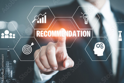 Businessman touching virtual screen with recommendation word and related icons on it