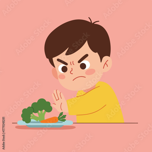 A child, frowning and pushing away a plate of broccoli and carrot, expressing dislike