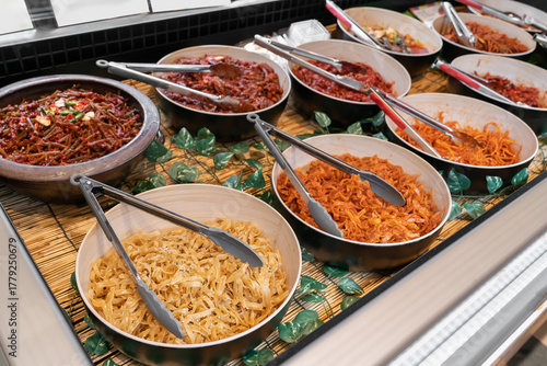 Various types of Korean food display showcases in food market.