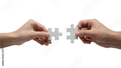 Two hands holding white puzzle pieces about to connect isolated on transparent background