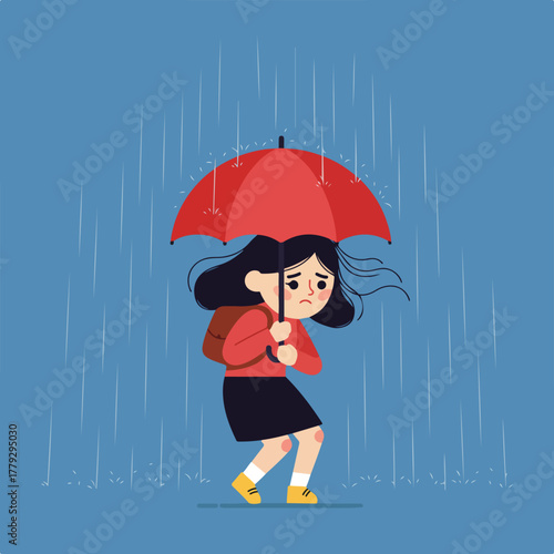 A child, shielding from rain with a red umbrella, stands in a downpour, looking upset
