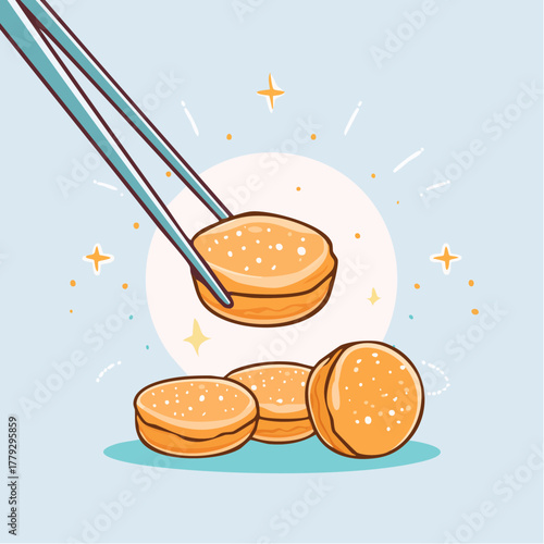 Close up of a round golden pastry being held by chopsticks with small star sparkles around it on a light blue background
