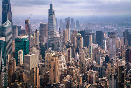 Golden skyscrapers of New York City midtown aerial view.