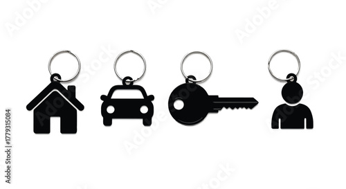Four black keychains isolated on white background in a horizontal row