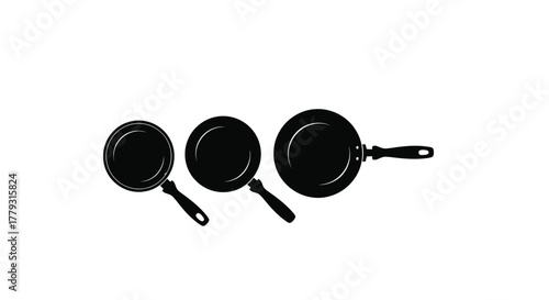 Three frying pans of different sizes isolated on white background