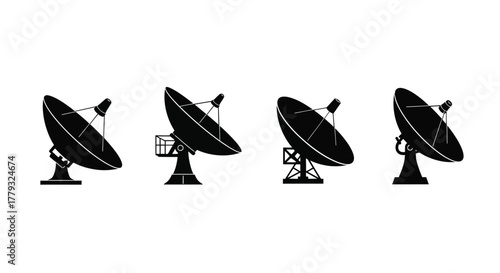 Four satellite dishes in black silhouette isolated on white background